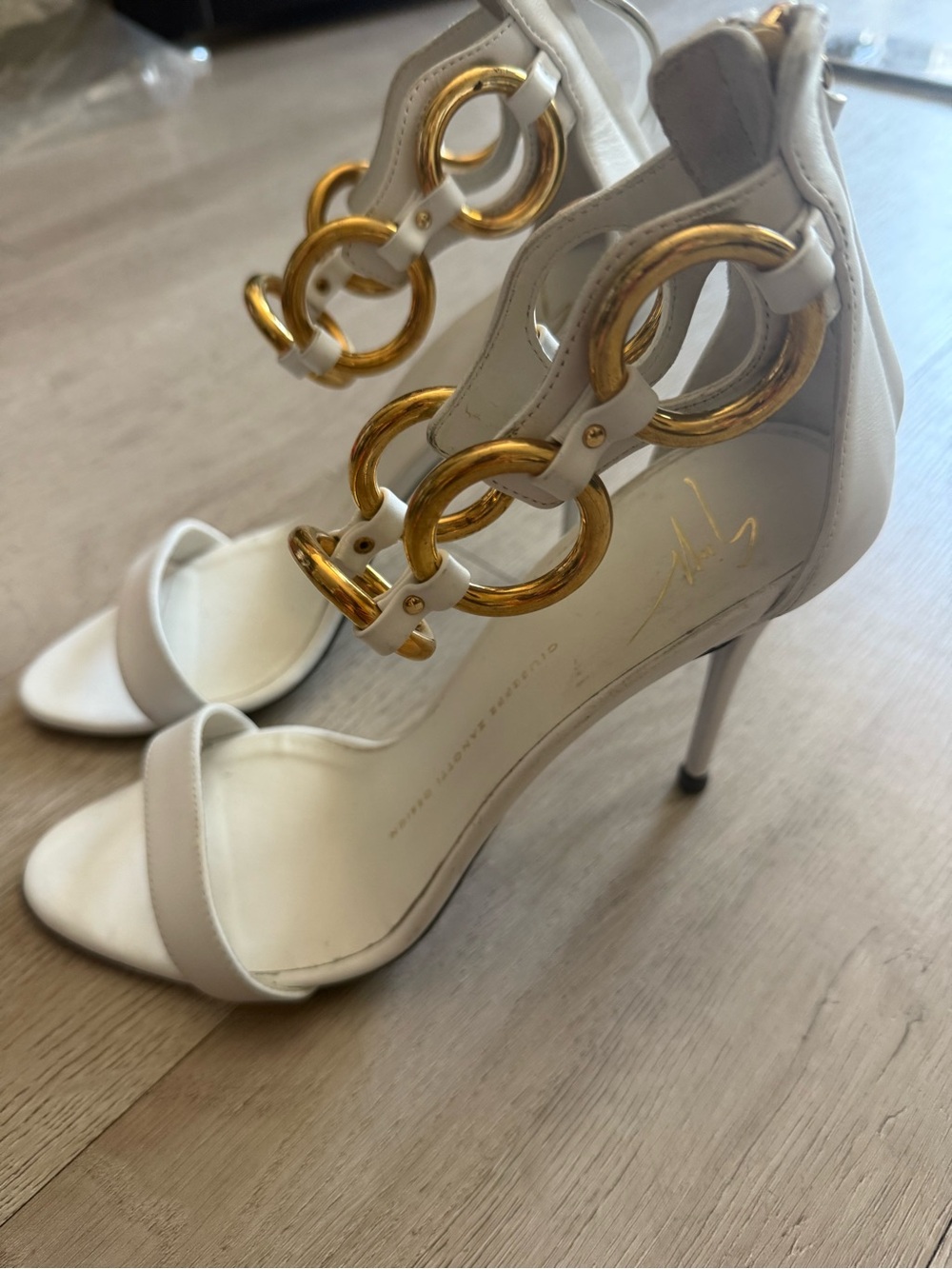 Giuseppe Zanotti White Stiletto Sandals with Gold Ring Ankle Harness